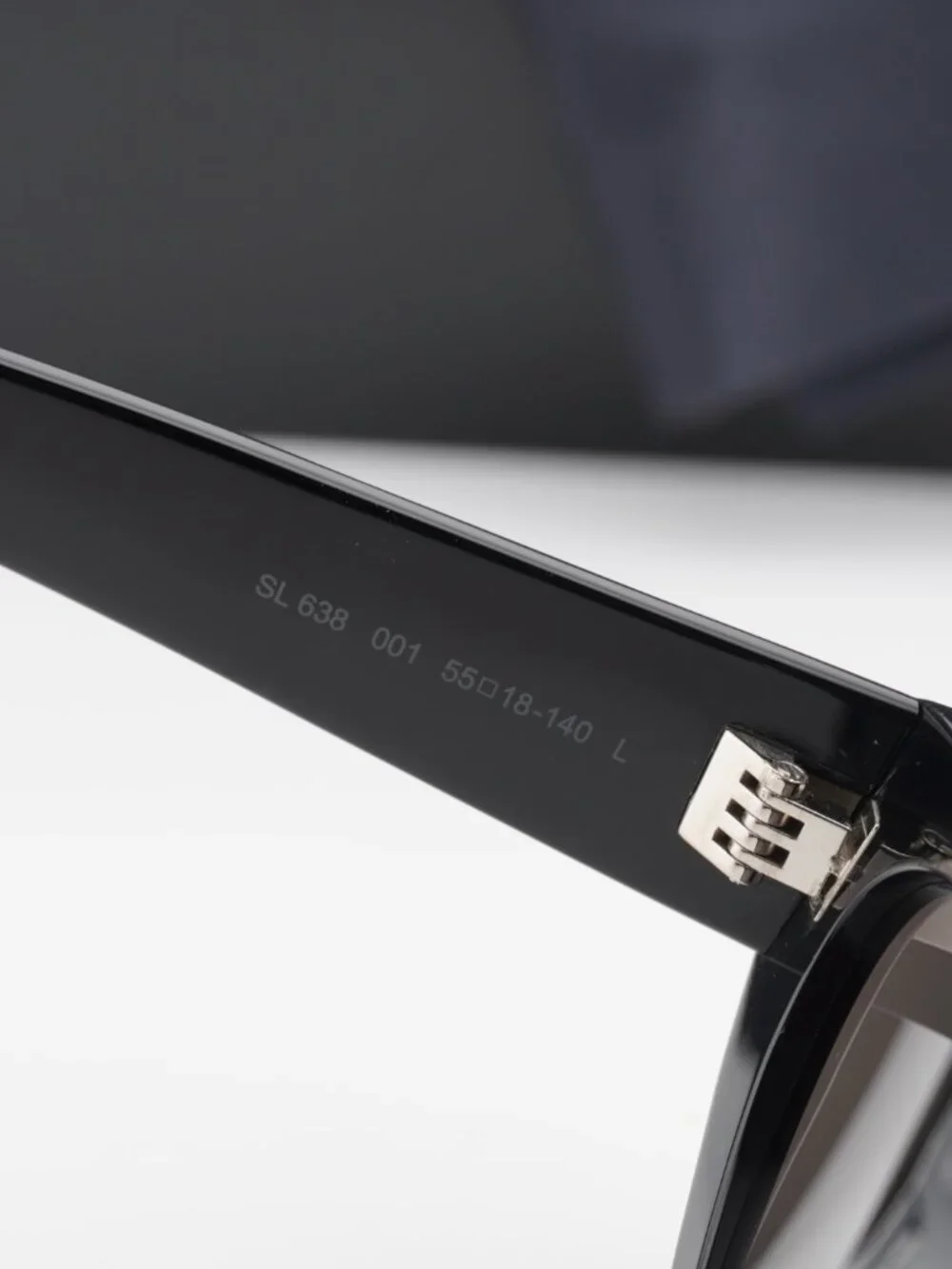 Saint Laurent SL638 001 Oval Sunglasses - Black / Black